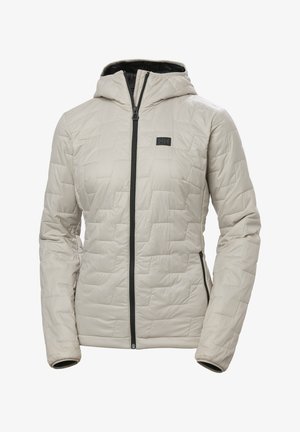 Ocieplana kurtka w jasnym beżu z teksturowanym pikowanym wzorem, z przodu na zamek błyskawiczny oraz czarnymi akcentami, w tym logo i mankietami. Posiada kaptur.