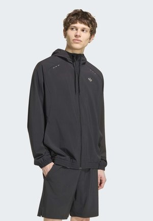 adidas Originals, TECH ESS TT - Chaqueta de entrenamiento - black