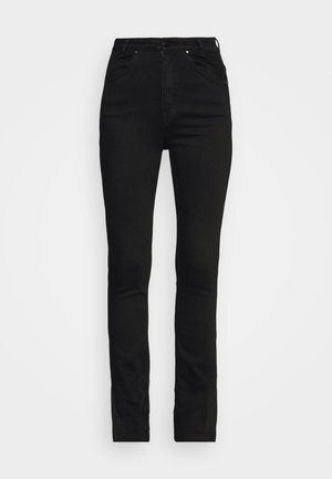 Jeans de denim preto com um corte skinny, cintura alta, design de cinco bolsos e detalhes de costura sutis. Textura suave, sem desgaste visível.