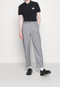 MOSCHINO Piké - black