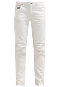 Jeans de mezclilla blanca con un corte ajustado, detalles de panel en las rodillas y un pequeño parche de logo en el bolsillo frontal. Textura suave, sin desgaste visible.