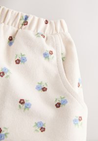 Next REGULAR FIT  - Hlače - ecru white ditsy floral