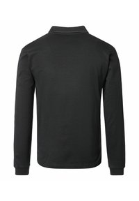 Sort langærmet polo skjorte med tekstureret stof, ribbet krave og manchetter. Simpelt design uden synlige mønstre eller udsmykninger.