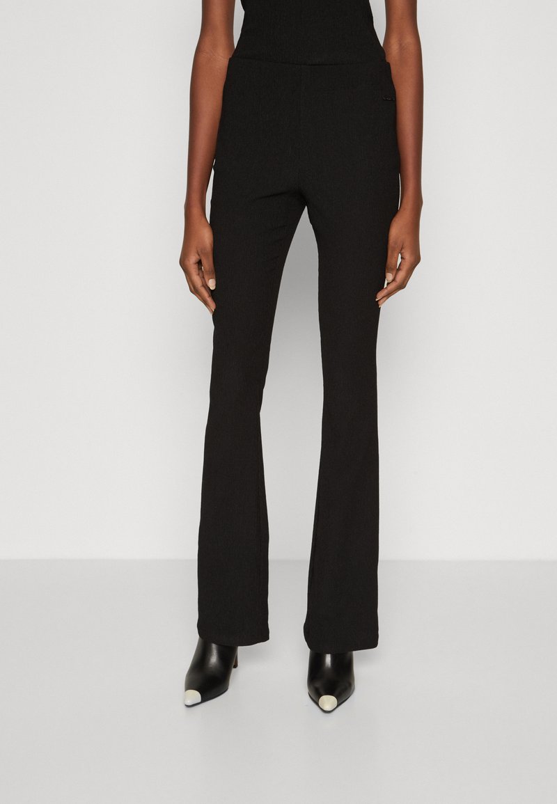 Calvin Klein CRINKLED FLARED - Pantaloni - black