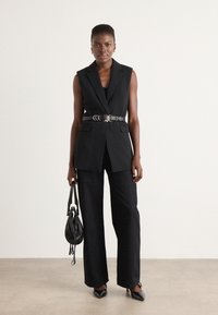 DKNY FUEN AERO  - Strukirani kaput - black