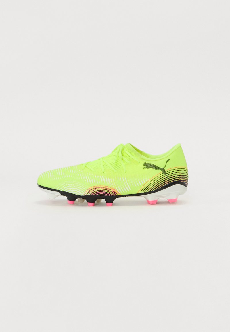 Soccer boots in bright neon yellow with black and pink accents. Features lightweight material, textured surface, and six traction studs.