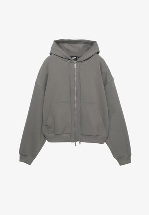 Felpa con cappuccio grigia con zip, cappuccio ampio, polsini e orlo a coste, e due tasche frontali. Realizzata in un materiale morbido e strutturato.