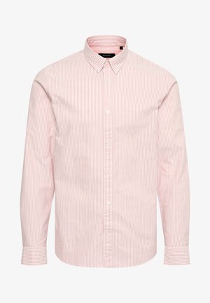 Koszula z guzikami z kołnierzykiem, w poziome różowe i białe paski, z długimi rękawami i białymi guzikami. Wykonana z tkanej bawełny.