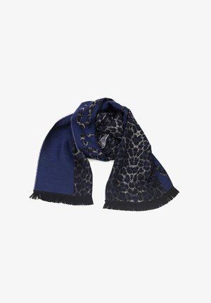 Écharpe bleu marine avec motif léopard noir et gris, bords à franges, posée à plat avec une extrémité enroulée.