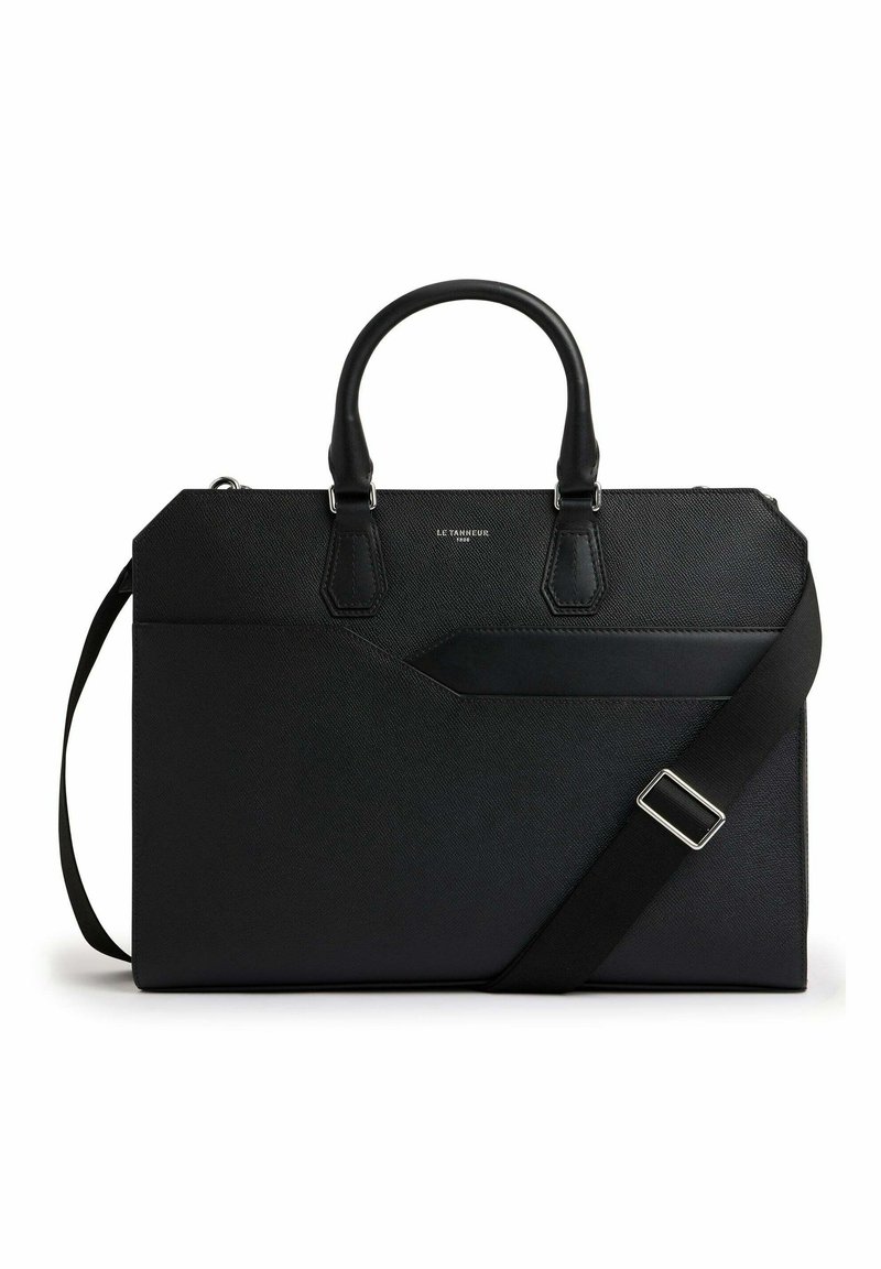 Black textured handbag with dual top handles and a detachable strap. Features a geometric design and a front pocket with a flap.