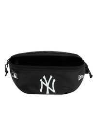 Black fabric pouch with white New York Yankees logo, zip closure, and adjustable drawstring. Textured surface, oval shape.