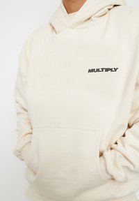 Multiply Apparel Mikina s kapucí - beige