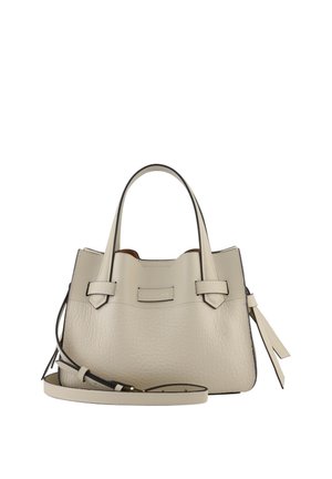 Beige textured leather handbag with two top handles, detachable shoulder strap, and decorative side tassels, shown on a white background.