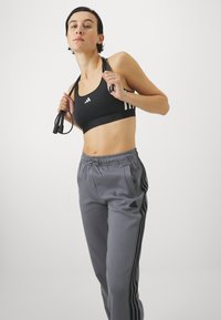 adidas Sportswear Tepláky - grey four
