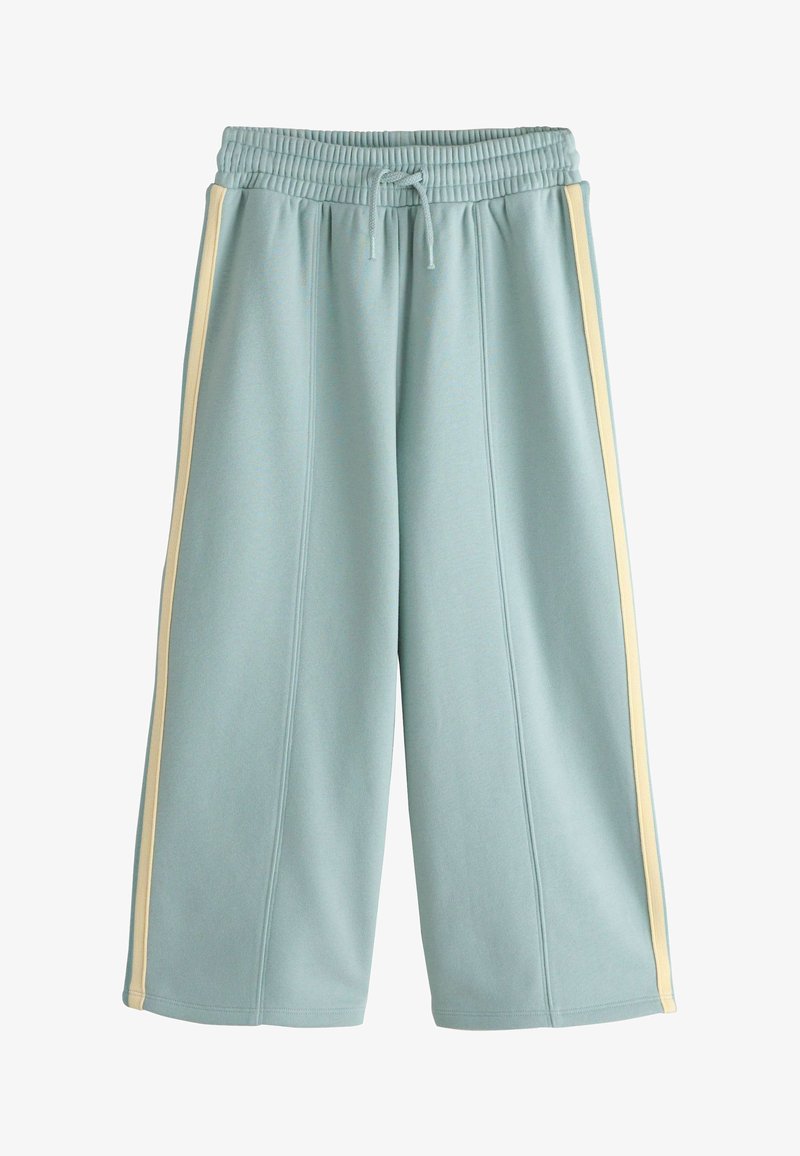 Pantalon large bleu clair avec taille élastique, cordon de serrage et bandes latérales beiges.