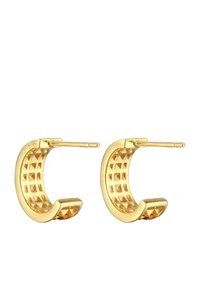 Boucles d'oreilles en or en forme de créoles avec un motif texturé en grille sur la surface intérieure et des accents triangulaires pointus aux extrémités.