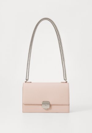 Pink vegan leather handbag with silver chain strap, rectangular shape, flap closure, and subtle branding on the clasp. Smooth texture.