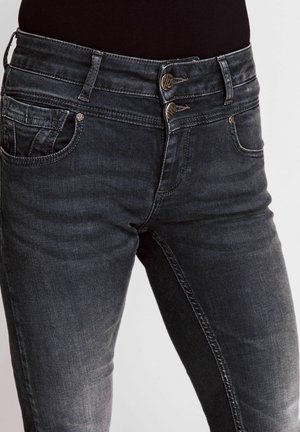 Dark gray denim jeans with a textured finish, two-button closure, and front pockets. Features minimal fading and contrasting stitching.