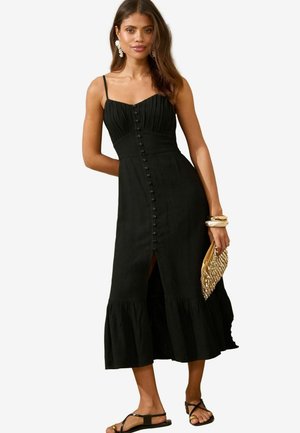 Schwarzes Leinen-Midikleid mit tailliertem Oberteil, Knopfleiste vorne, Spaghettiträgern und einem gerafften Saum, versehen mit einem seitlichen Schlitz.