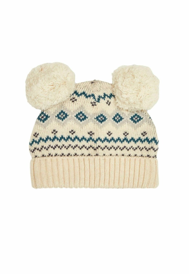 Strikket vinterhue i creme med teal og sorte geometriske mønstre, med to fluffy pomponer på toppen og en ribbet krave.
