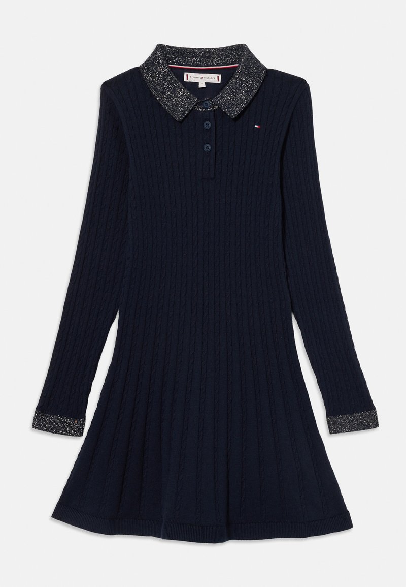 Rochie tricotată de culoare bleumarin, cu mâneci lungi, textură ribbed, guler și manșete strălucitoare. Placket cu trei nasturi la gât. Fustă evazată.