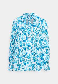 Blusa branca com padrão floral azul, detalhes drapeados, mangas longas e uma gola amarrada. Tecido leve com uma textura suave.