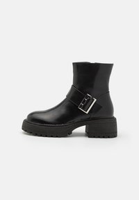 Bottines à plateau - black