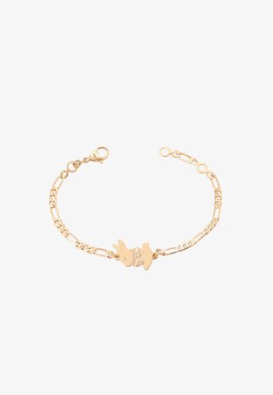 Aranyszínű karkötő, dekoratív bájjal, amely íj formájú és nyúlszilhouetteket tartalmaz, lánc designnal és homárkapoccsal.