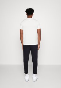 Tommy Hilfiger Verryttelyhousut - dark blue