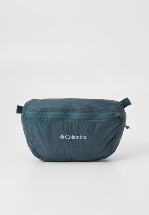 Marsupio Columbia di color blu scuro con una tasca frontale con cerniera e anelli laterali su sfondo bianco.