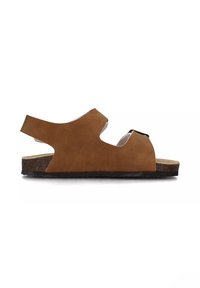 Sandal in pelle marrone con retro aperto, design con ritagli e suola in sughero. Dotato di cinturini regolabili per una vestibilità sicura. Stile piatto e casual.