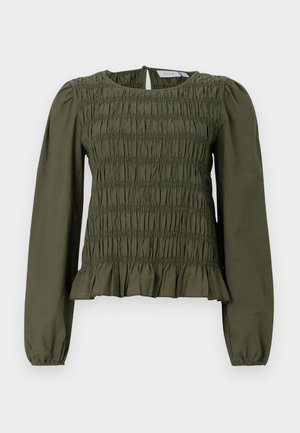 Olivengrünes Langarmoberteil mit gerüschtem Stoff und Rüschensaum. Rundhalsausschnitt mit Knopfverschluss auf der Rückseite. Aus leichtem Material gefertigt.