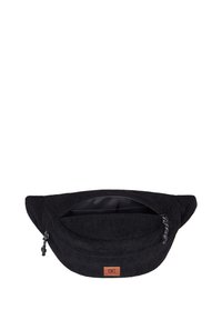 Svart kordoroy-väska med en smidig insida, dragkedjestängning och en liten märkesläderpatch. Har en rundad, kompakt design.