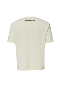 Cremefarbene Baumwoll-T-Shirt mit kurzen Ärmeln, rundem Ausschnitt und schwarzem Text auf dem Rücken, der "HANGING AROUND Seit 1950" sagt.
