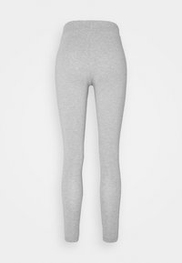Grå leggings med en slät yta, elastisk midja och en figurnära design som smalnar av vid vristerna. Inga synliga mönster eller detaljer.
