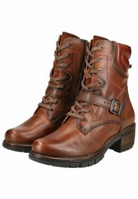 Botas de tobillo de cuero marrón con diseño de cordones, detalle de hebilla lateral y suela de goma texturizada. Tacón resistente y acabado suave.