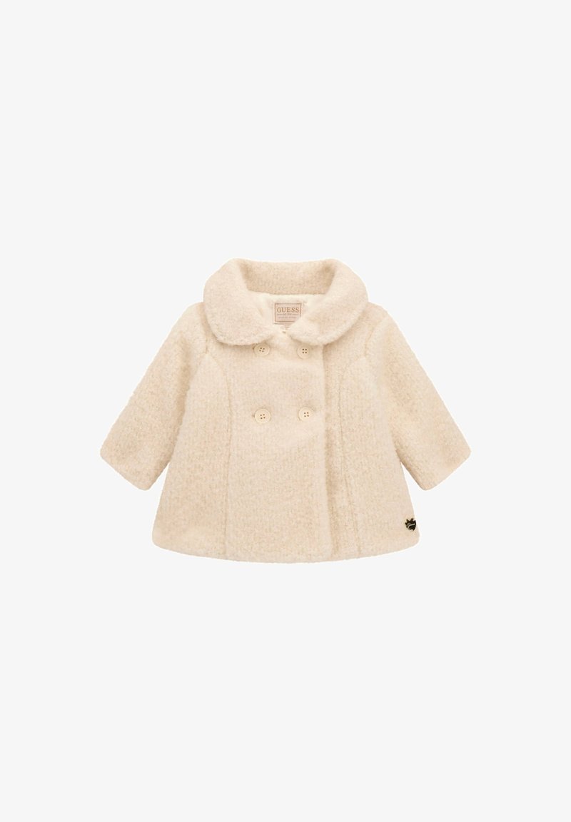 Manteau en laine couleur crème pour tout-petit à double boutonnage, col large et manches longues, avec quatre boutons et un petit logo noir près de l'ourlet.