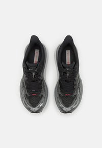 HOKA STINSON 7 - Zapatillas de trail running - black/outer orbit