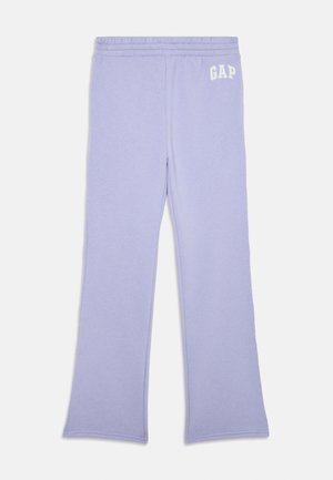 Lilac straight-leg sweatpants with elastic waistband and white GAP logo on the upper left thigh, laid flat on white background.