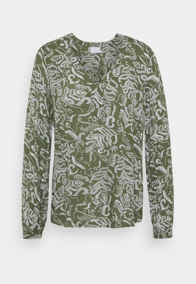 Blouse verte à manches longues avec motif blanc de feuilles et de fougères et col rond.