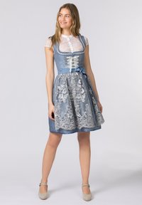 Blue floral-patterned dress with a textured bodice, lace-up front, satin ribbon tie, and a flared satin skirt. Accented with a white lace top.