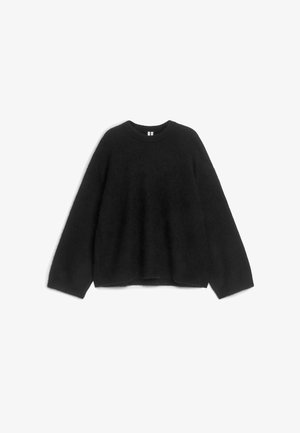 Black knitted sweater, round neckline, long sleeves, loose fit, soft texture, no visible patterns or accents. Suitable for casual wear.