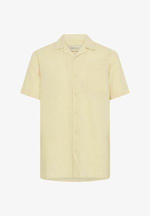 Lühikeste varrukatega nööpidega särk heledast kollasest kangast, millel on vasakul rinnal tasku ja klassikaline kraedi design.