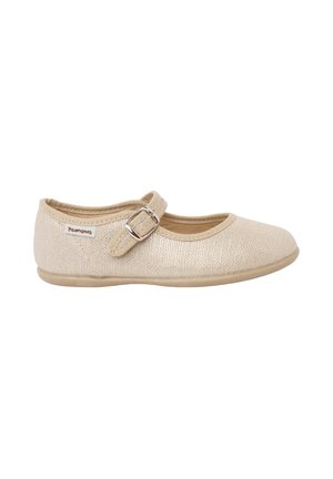 Chaussure Mary Jane beige avec une tige en tissu texturé, bride réglable à boucle et semelle plate, conçue pour un usage décontracté.