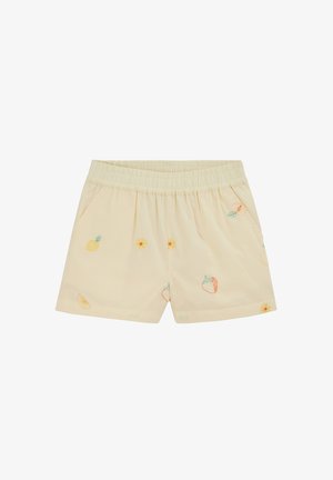 Short en beige clair avec taille élastique, orné de petits motifs brodés de fruits et de fleurs en jaune, orange, rouge et vert.