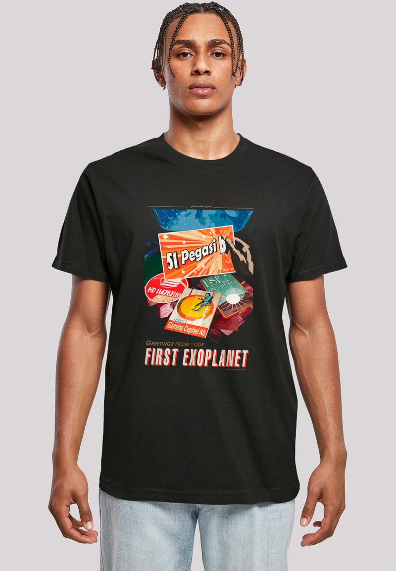 Black cotton t-shirt featuring a colorful graphic print with space-themed designs and text, including "51 Pegasi b" and "Greetings from your First Exoplanet."