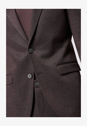 Donkere bruin colbert met een gestructureerde afwerking, voorzien van twee voorkezen, zwarte knopen en een notch-reepdesign.