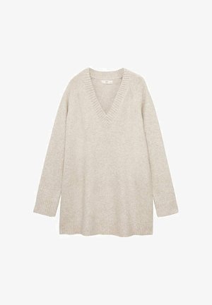 Pull oversized beige clair avec un col en V, des manches longues et des poignets et un ourlet côtelés. Texture douce, détails minimaux et coupe confortable.