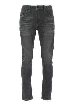 Tumedate hallid teksad, valmistatud denimist, kitsas lõige, viie taskuga disain, tagasihoidlikud kulumismustrid ja bränditud silt vööl.