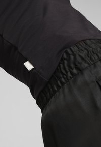 Puma INFUSE SLIM FIT TANK - Tops - black